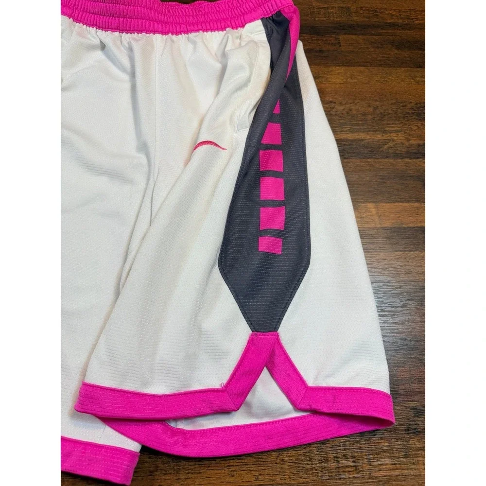 Youth dri-fit Nike Elite basketball shorts pink and white.  Size large.  Unisex